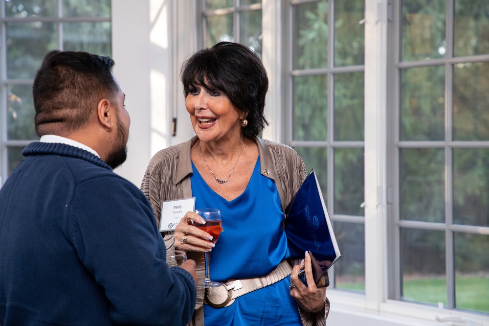 President Mantella talking to man